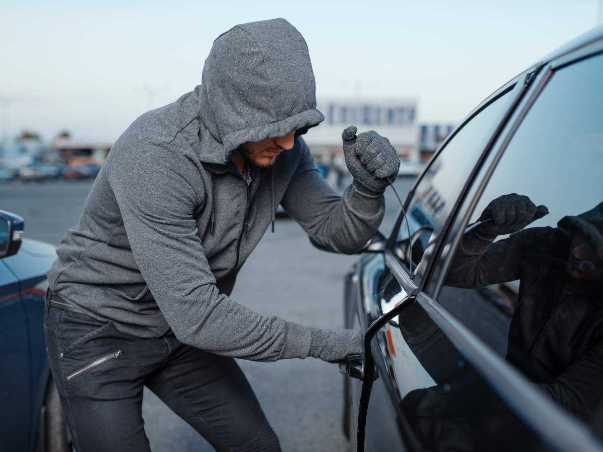 Criminal attempting to steal car